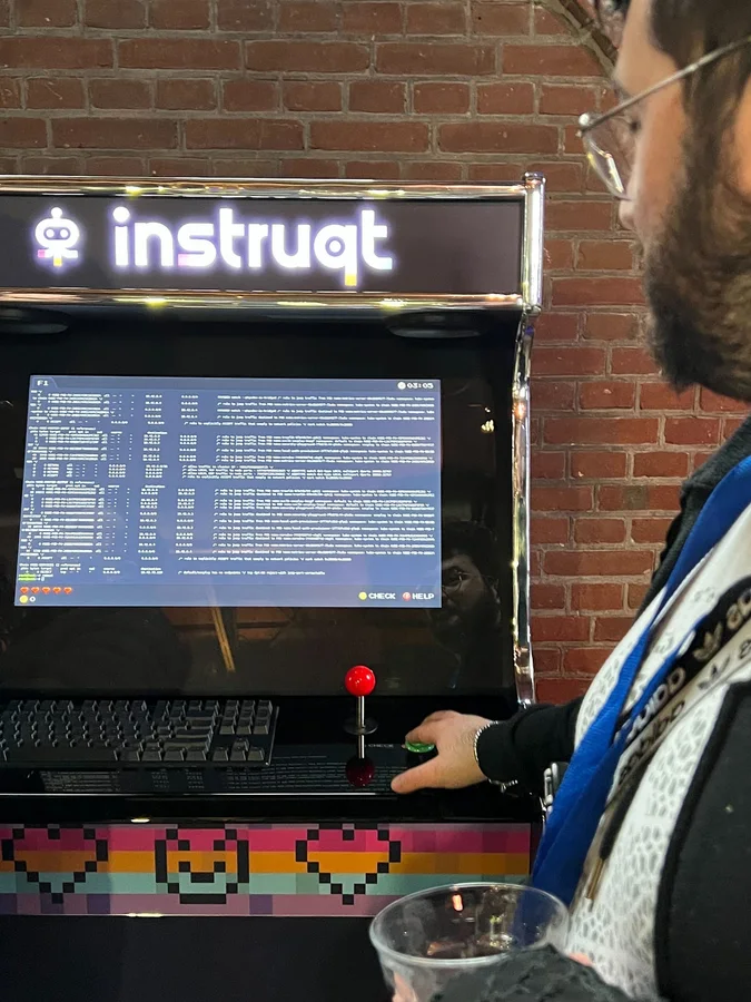 An arcade controller and terminal during Kubernetes Community Days