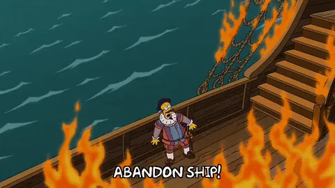An animated ship captain pointing at an abandon ship sign